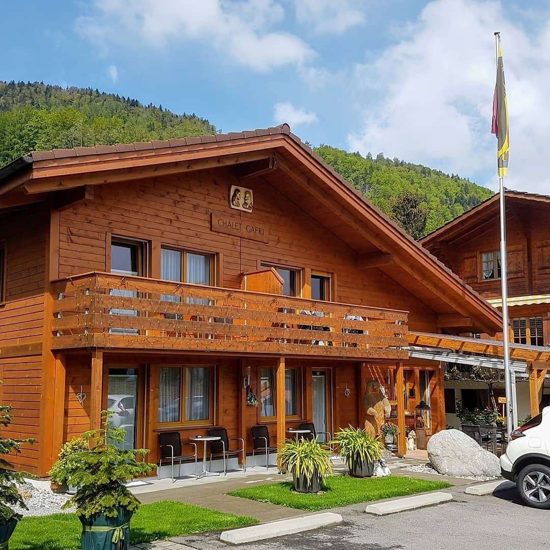 Timber chalet exterior with the Chalet Gafri sign