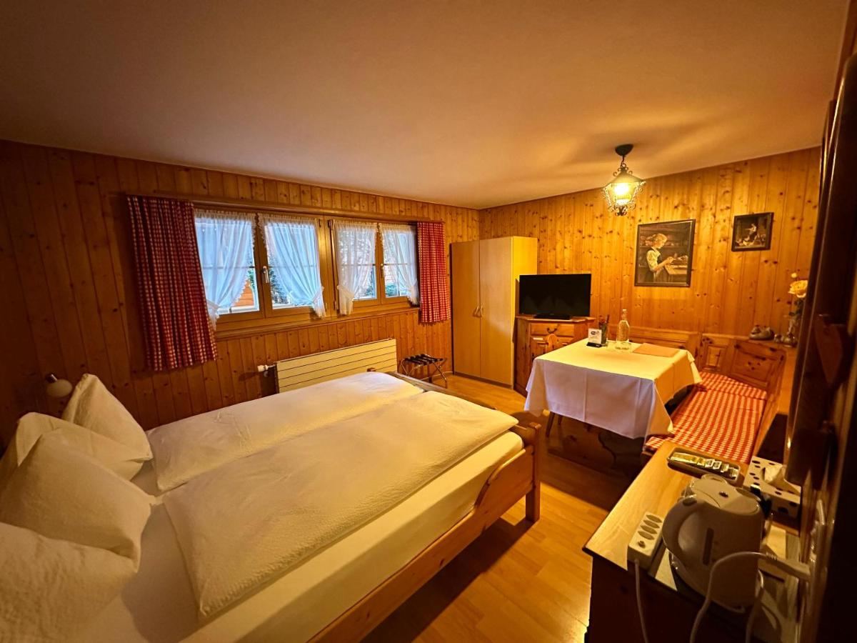Guest room with traditional timber panelling